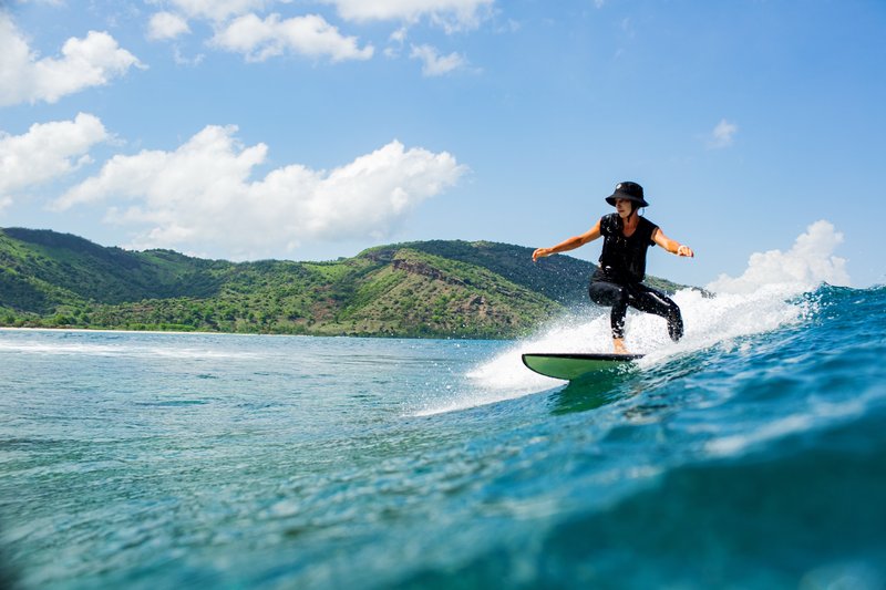 Surfing a blue wave off Manuel Antonio